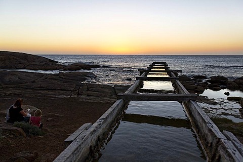 People at the wooden water channel leading to the Cape Leeuwin water wheel, Augusta, Western Australia, Australia