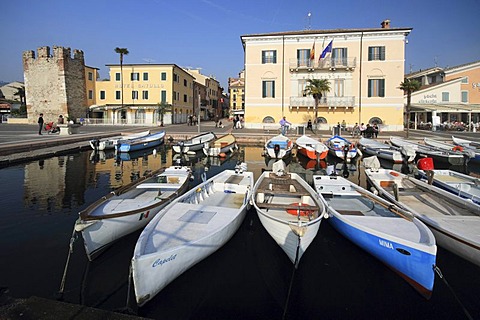 Fishing boats in the harbour and the lakeside promenade, Bardolino on Lake Garda, province of Verona, Veneto region, Italy, Europe