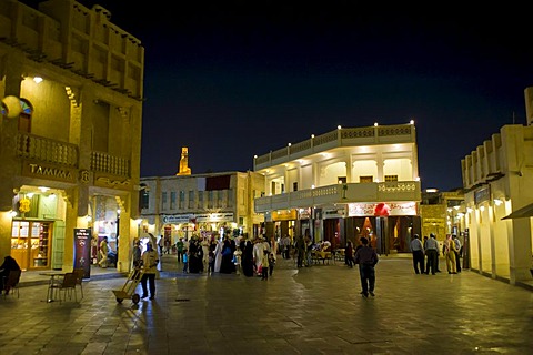 Visitors in the renovated bazaar Souq Waqif, Doha, Qatar, Arabian Peninsula, Middle East