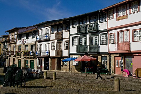 Row of houses with a few small shops, historic district, Guimaraes, Portugal, Europe