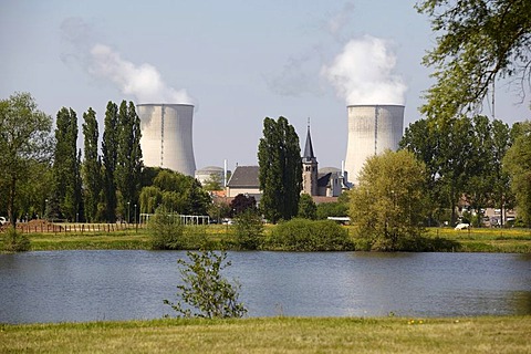 Two cooling towers of the French Cattenom Nuclear Power Plant, the church of Cattenom standing between the cooling towers, Lorraine region, France, Europe