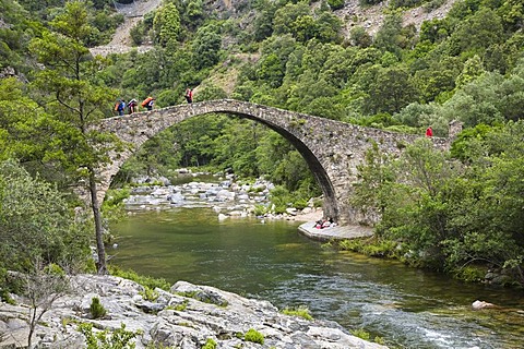 Old Genovese stone bridge over the River Porto near the village of Ota, Spelunca Gorges, Corsica, France, Europe