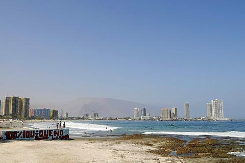 Playa Cavancha beach, coast, waves, multistory buildings, Iquique, Norte Grande, northern Chile, Chile, South America