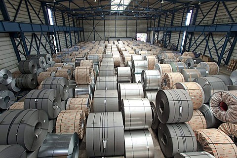 Finished flat steel rolls waiting for shipment, steelworks of ArcelorMittal, Eisenhuettenstadt, Brandenburg, Germany, Europe