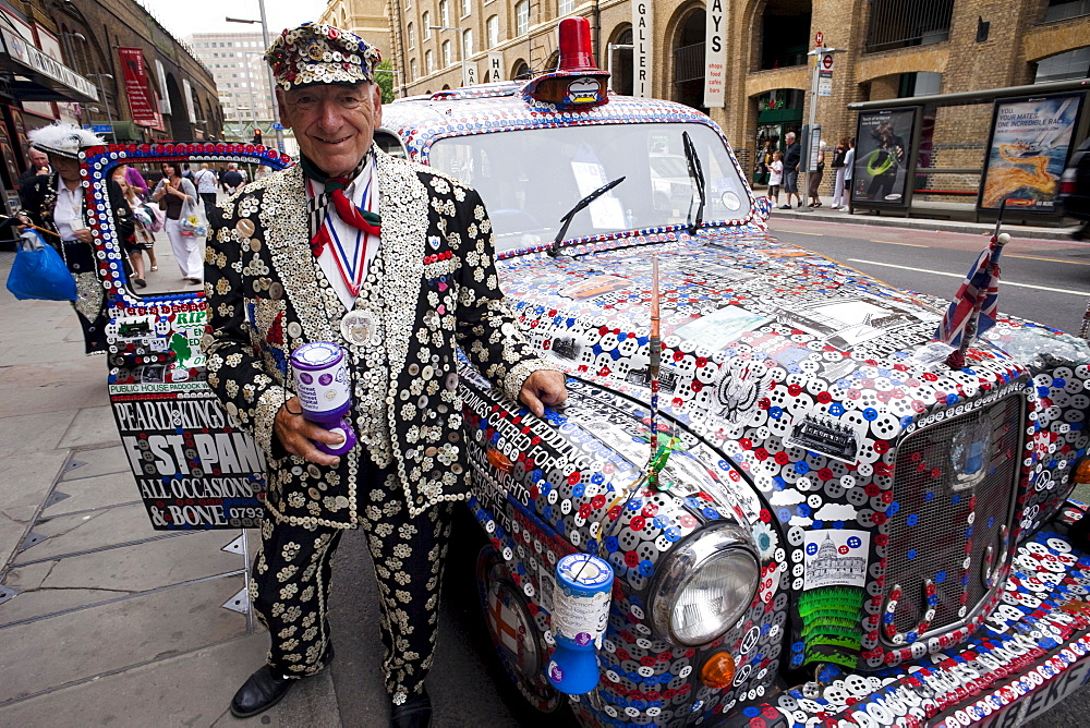 Pearly King and decorated London taxi, London, England, United Kingdom, Europe