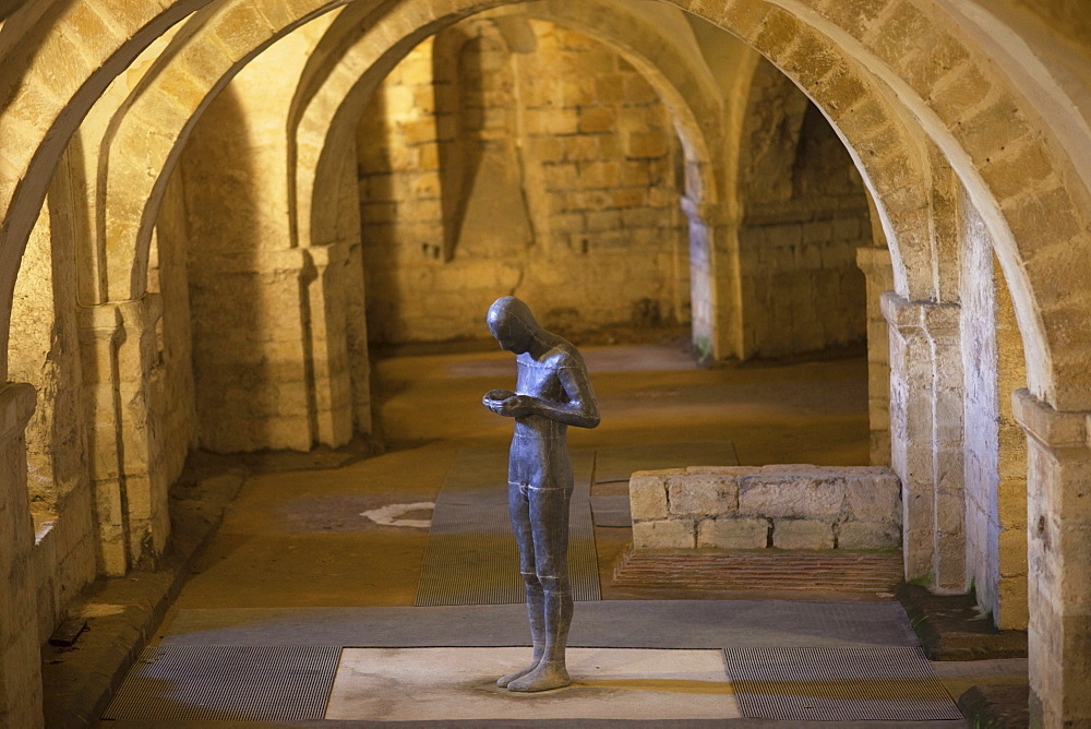 Antony Gormley's sculpture Sound II in the Crypt, Winchester Cathedral, Winchester, Hampshire, England, United Kingdom, Europe