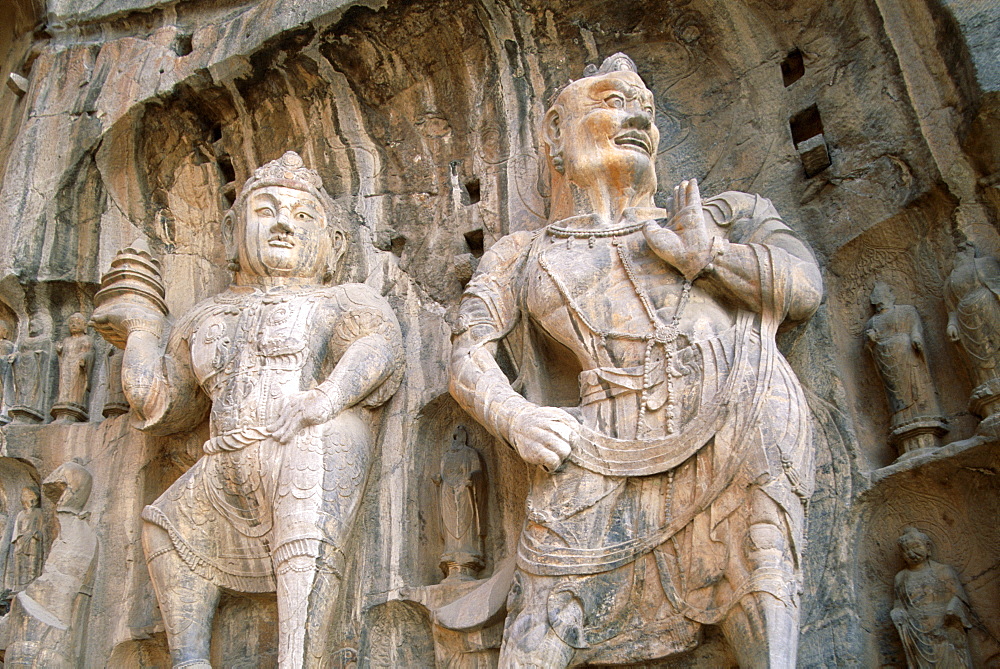 Bodhisattva and Guardian statues, Longmen Buddhist Caves, Ancestor Worshipping Temple dating from the Tang Dynasty, UNESCO World Heritage Site, Luoyang, Henan Province, China, Asia