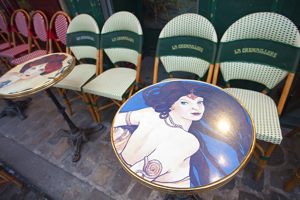 Detail of table and chairs at an outdoor cafe, Montmartre, Paris, France, Europe