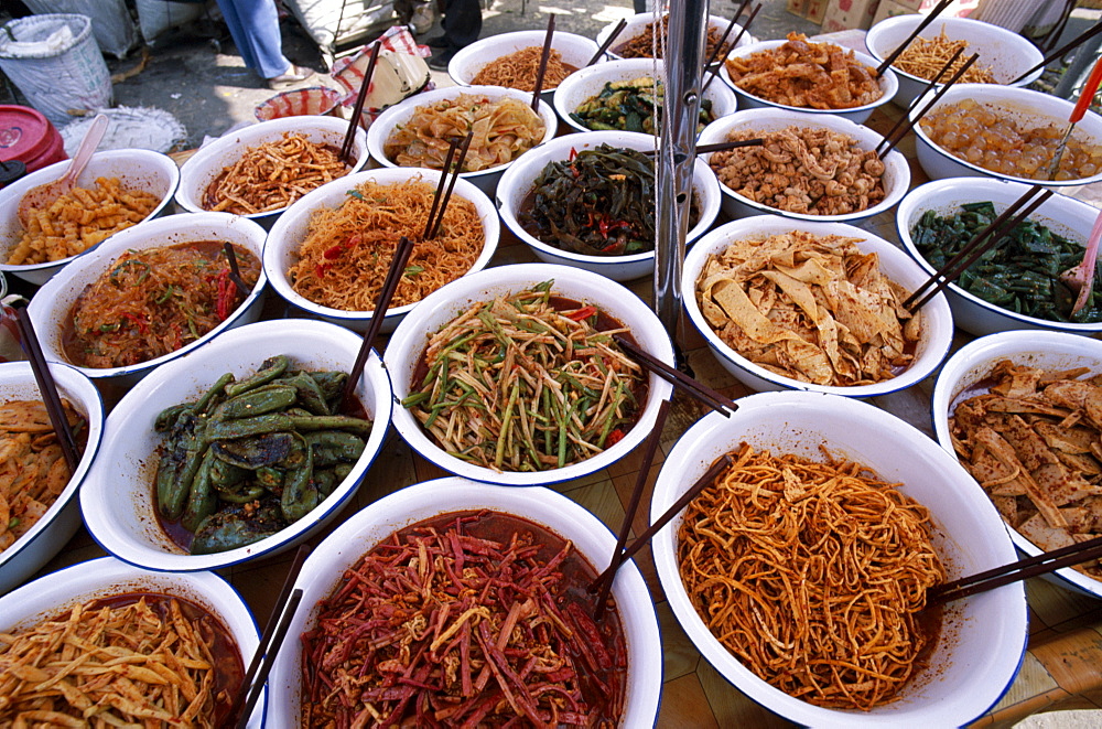 Local food display in Market Square in Old Town, Lijiang, Yunnan Province, China, Asia