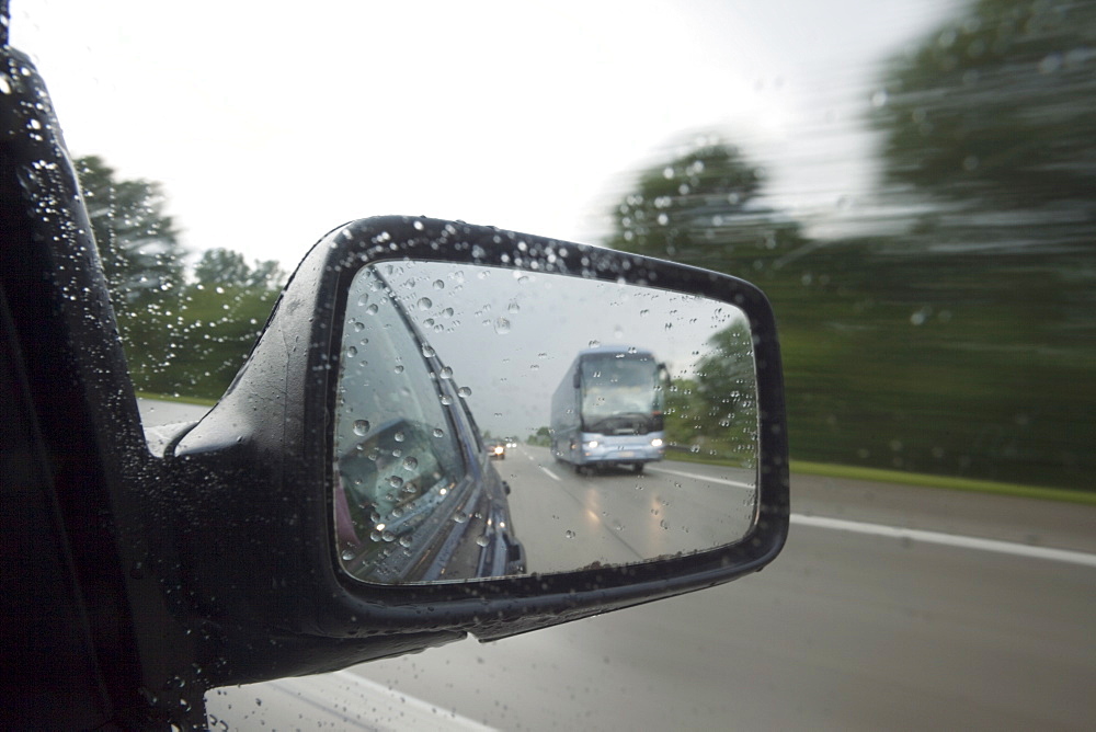 Highway view from moving car on rainy day, Munich, Bavaria, Germany, Europe