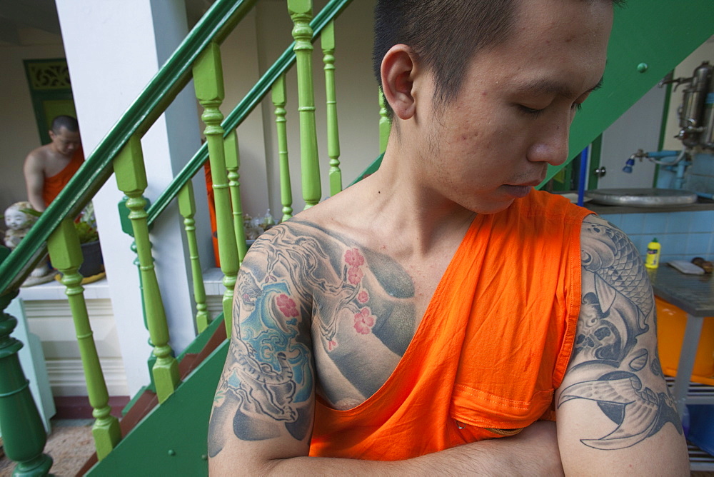 Monk with tiger tatoo on upper arm, Bangkok, Thailand, Southeast Asia, Asia