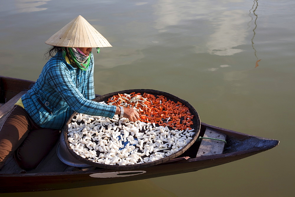 Boat woman and dried products, Hoi An, Vietnam, Indochina, Southeast Asia, Asia