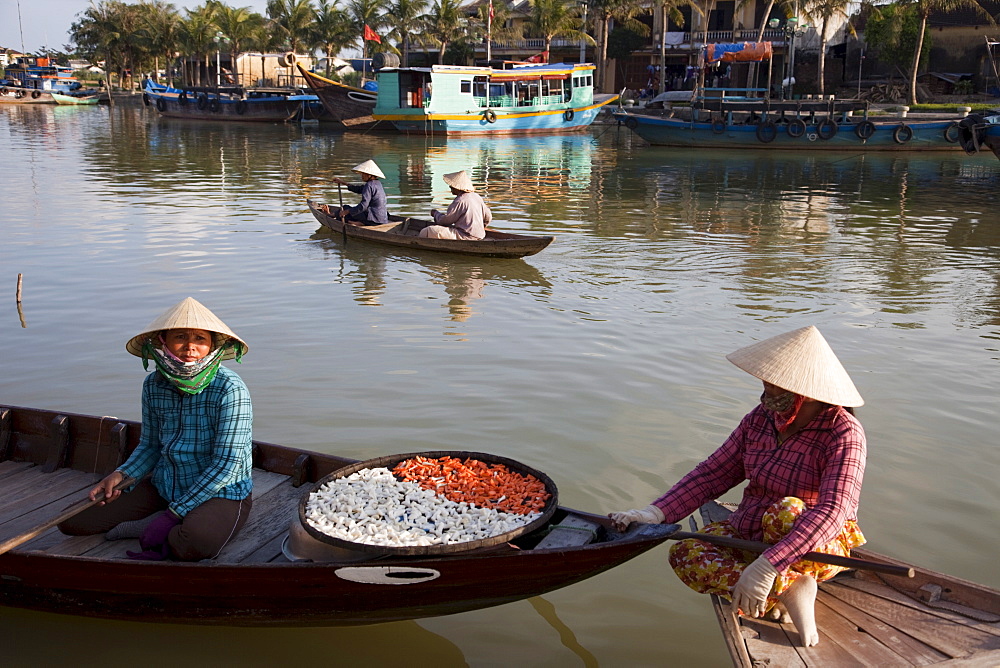 Boat woman and dried products, Hoi An, Vietnam, Indochina, Southeast Asia, Asia