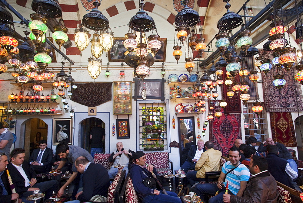 Customers smoking waterpipes in a coffee shop, Sultanahmet, Istanbul, Turkey, Europe