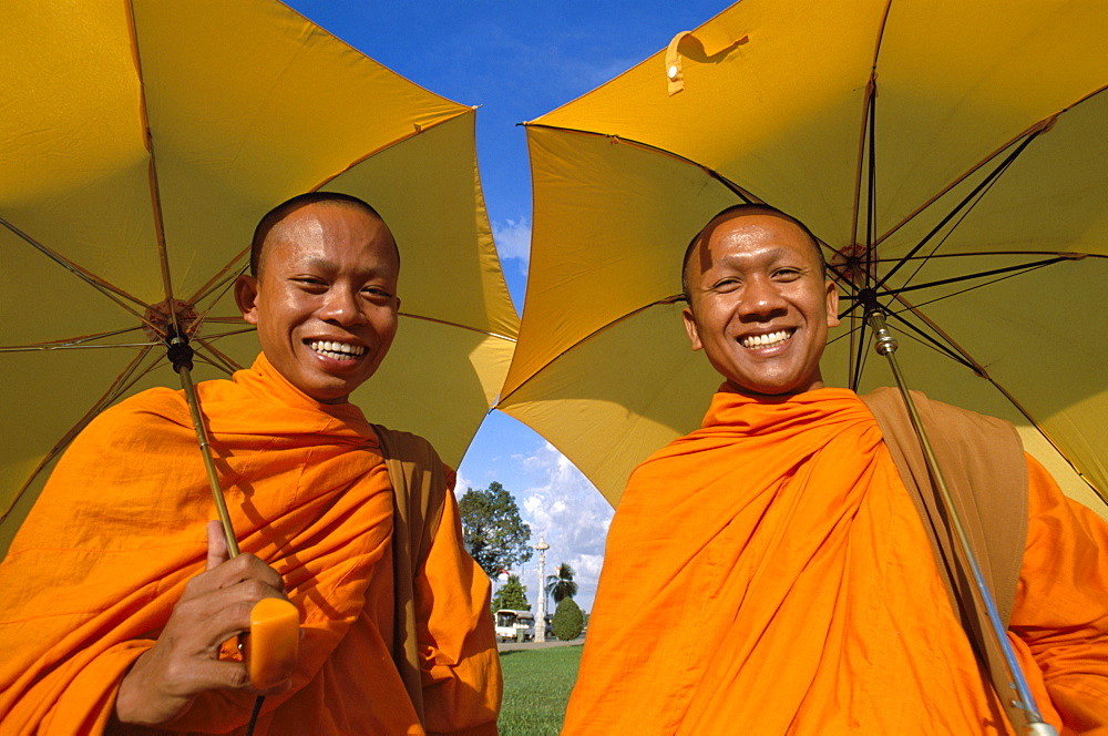 Monks posing, Phnom Penh, Cambodia, Indochina, Southeast Asia, Asia
