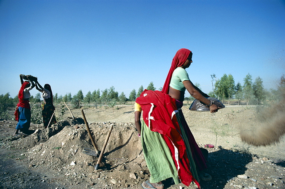 Women workers building highway, Rajasthan, India, Asia