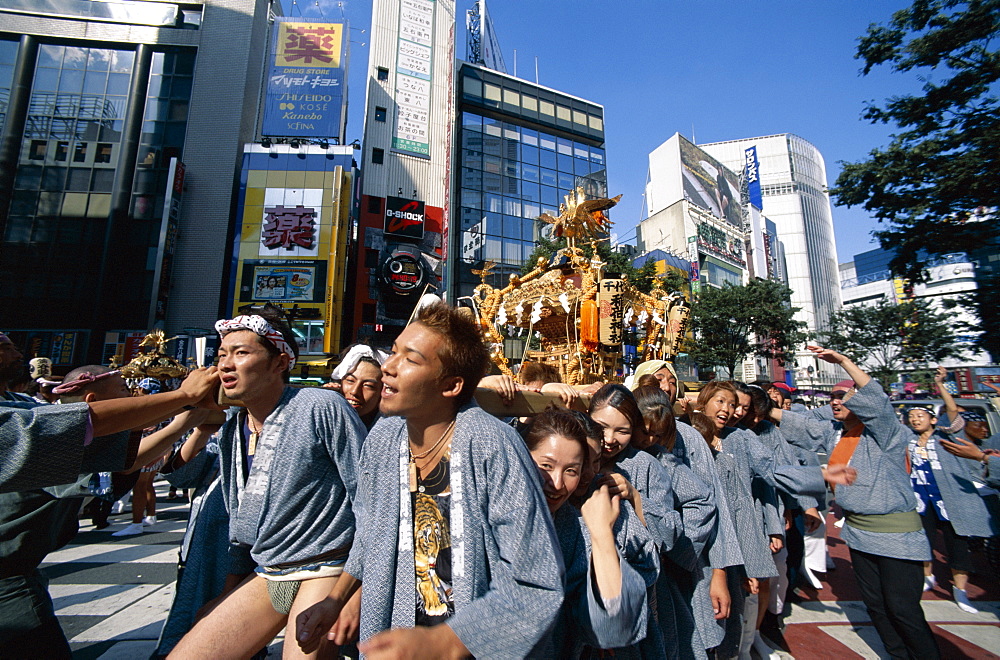 People carrying portable shrine (mikoshi), Festival (Matsuri),  Tokyo, Honshu, Japan, Asia