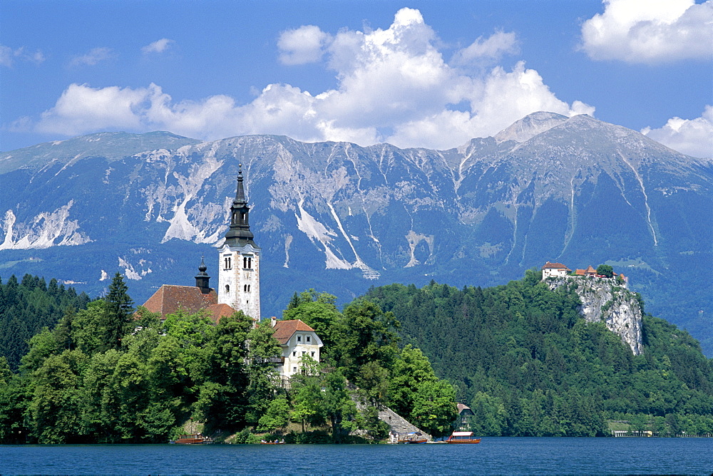 Church of the Assumption and Julian Alps, Lake Bled, Bled, Gorenjska Region, Slovenia, Europe