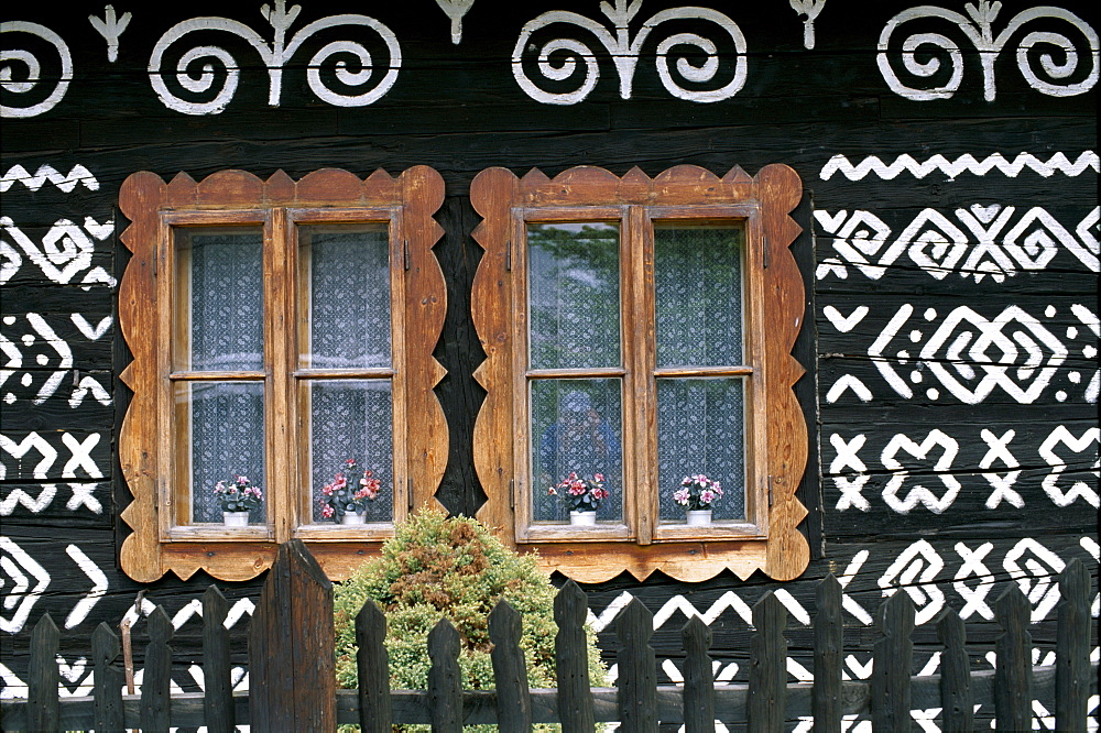 Decorative patterns on traditional painted house, Cicmany, The Mountain Regions, Slovakia, Europe