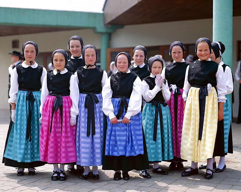 Group of girls in Breton traditional dress, Brittany, France, Europe