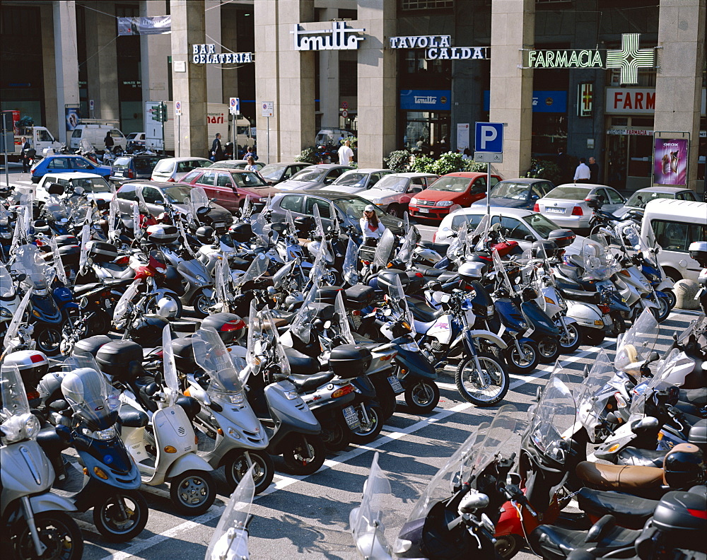 Motorcycles (Vespas) in carpark, Genoa (Genova), Liguria, Italy, Europe