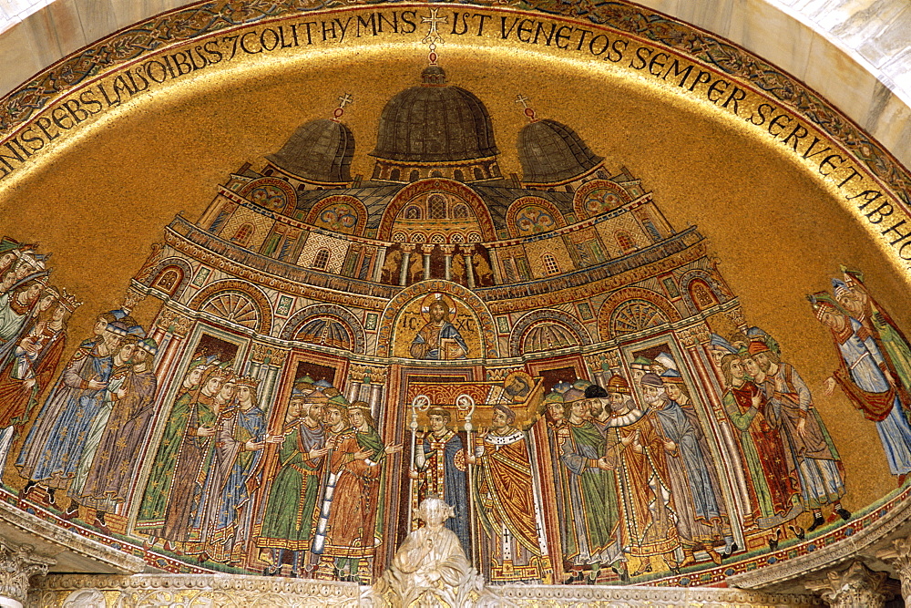 Mosaics on facade showing body of St. Mark being carried into the Basilica, St. Marks Basilica (Basilica di San Marco), UNESCO World Heritage Site, Venice, Veneto, Italy, Europe