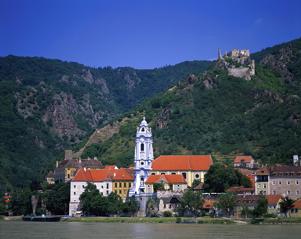 Stiftskirch church with Baroque tower and Danube River (Donau River), Durnstein, Wachau, Austria, Europe