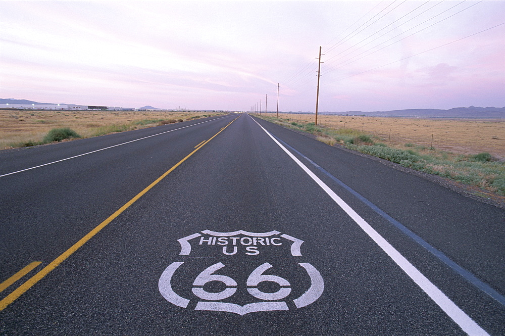 Route 66 sign on empty Road, Historic Route 66 Highway, Seligman, Arizona, United States of America, North America