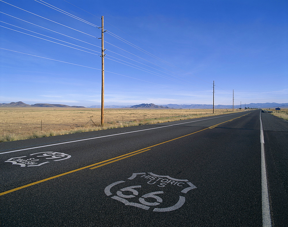 Route 66 sign on empty Road, Historic Route 66 Highway, Seligman, Arizona, United States of America, North America