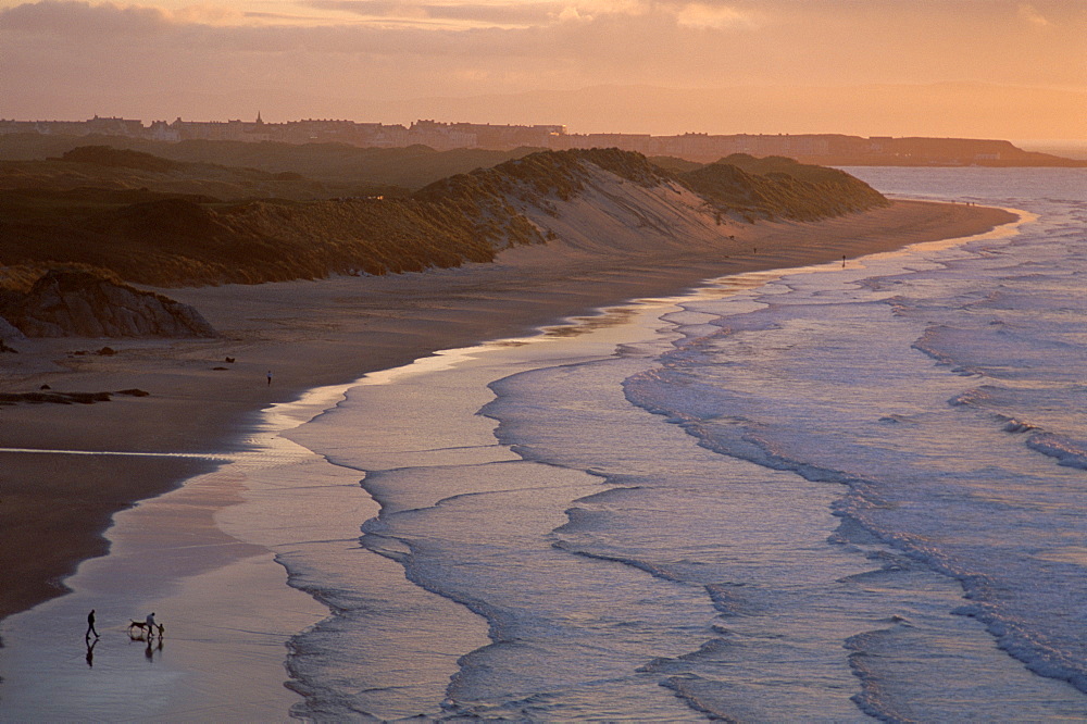 Sunset over the sea, Portrush Beach, County Antrim, Ulster, Northern Ireland, United Kingdom, Europe