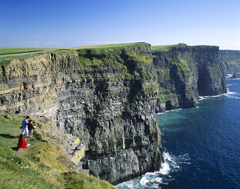 People on cliff top, Cliffs of Moher, County Clare, Munster, Republic of Ireland, Europe