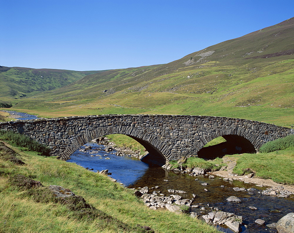 Stone bridge and rugged hills, Glen Clunie, Braemar, Grampian, Scotland, United Kingdom, Europe