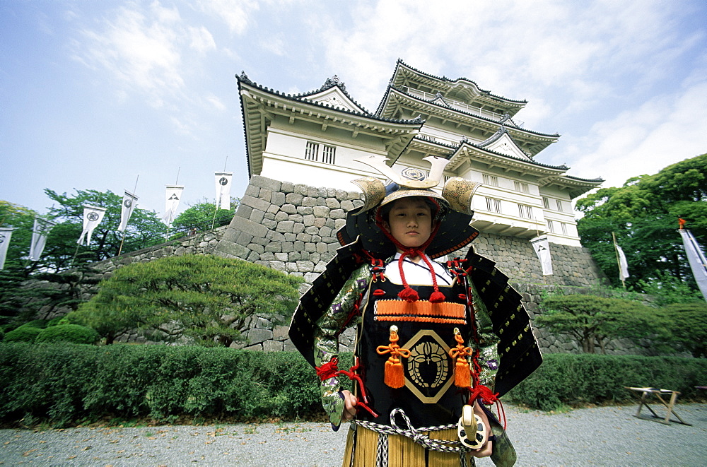 Young boy in Samurai costume in front of Odawara Castle, Kanagawa, Japan, Asia