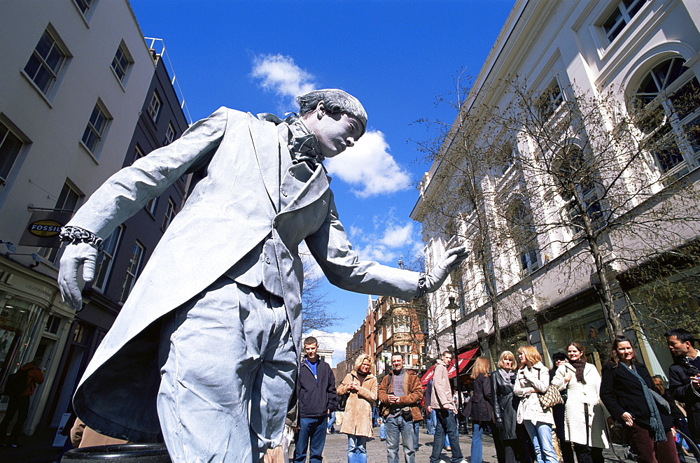 Human statue street performer, Covent Garden, London, England, United Kingdom, Europe