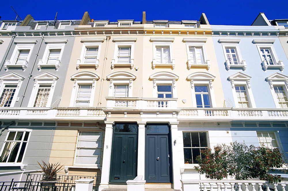 Painted stucco terraced houses in Priory Walk, South Kensington, London, England, United Kingdom, Europe