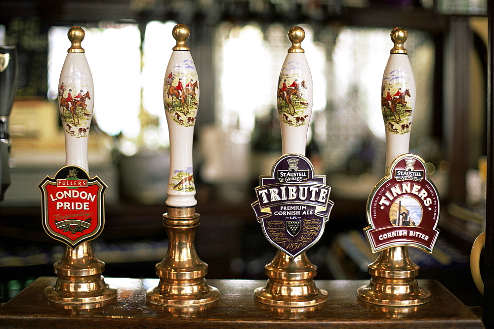 Typical pub beer pump handles, London, England, United Kingdom, Europe