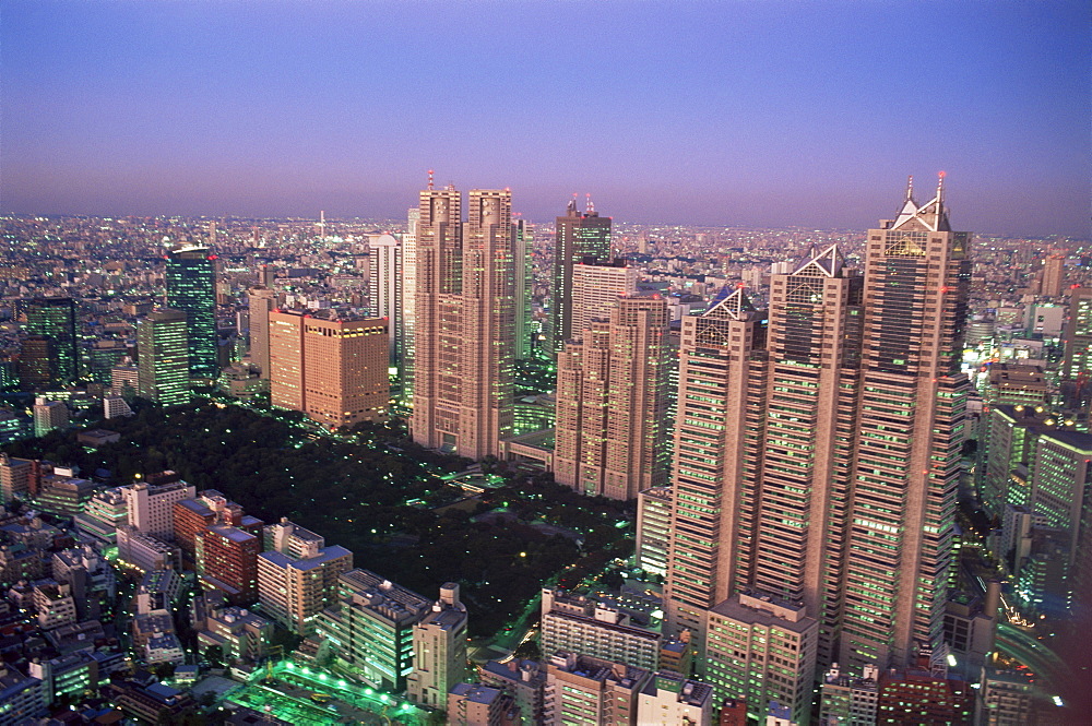 Shinjuku area skyline with Tokyo Gas Buildings and Tokyo City Hall in the foreground, Shinjuku, Tokyo, Japan, Asia