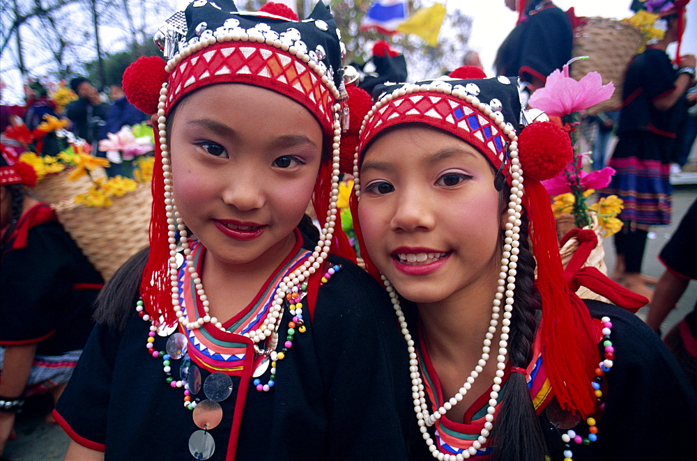 Akha hilltribe girls wearing traditional dress, Chiang Rai, Golden Triangle, Thailand, Southeast Asia, Asia