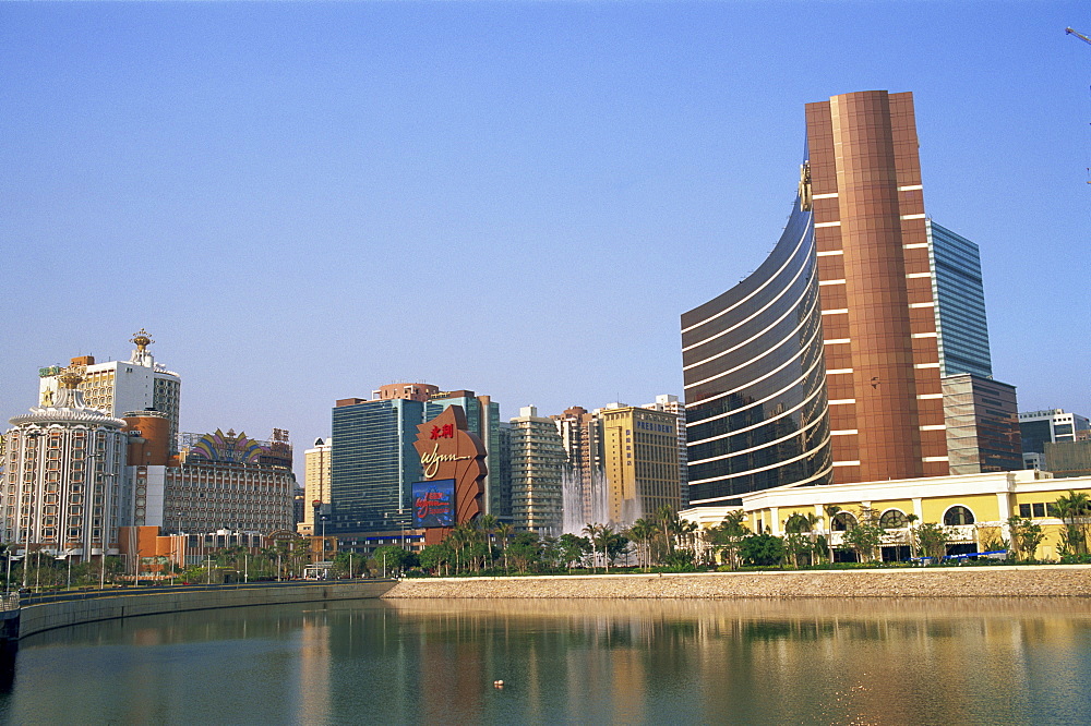 City skyline with Wynns and Lisboa Hotels and Casinos, Macau, China, Asia