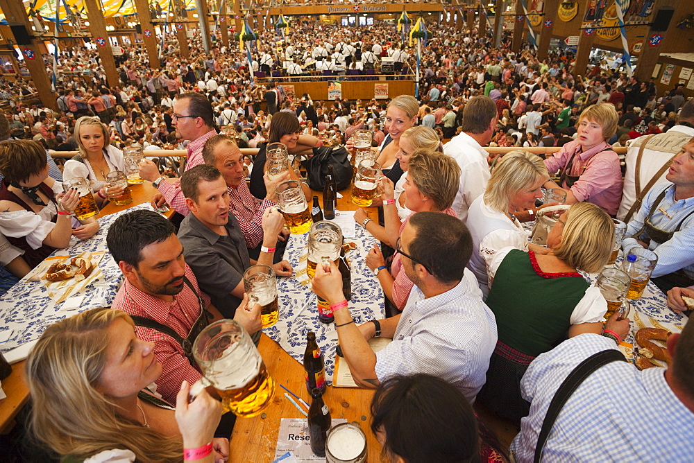 Typical beer tent scene, Oktoberfest, Munich, Bavaria, Germany, Europe