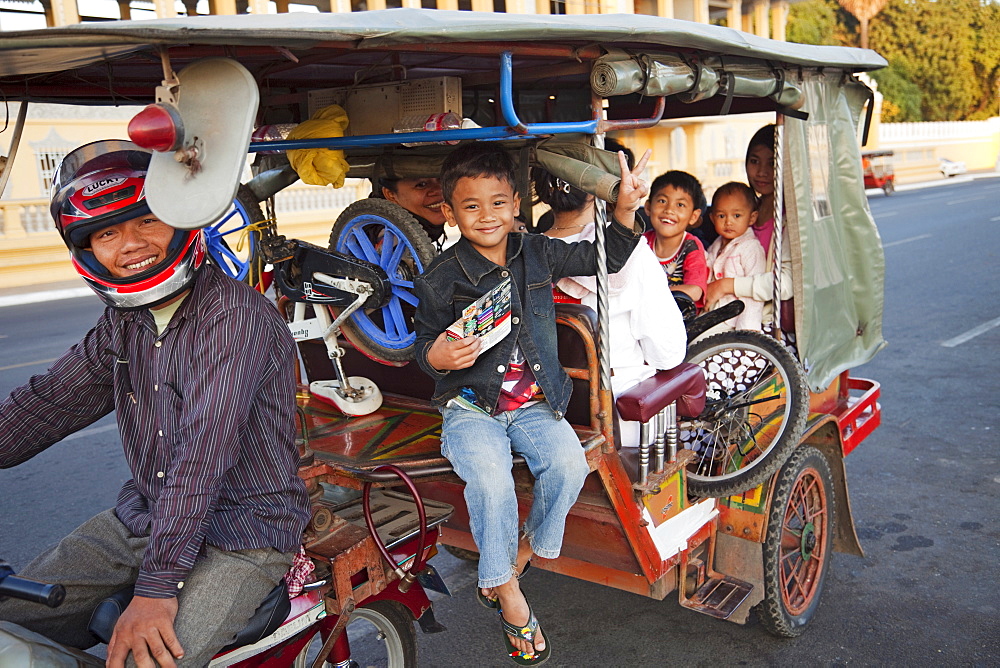 Family in a tuk tuk, Phnom Penh, Cambodia, Indochina, Southeast Asia, Asia