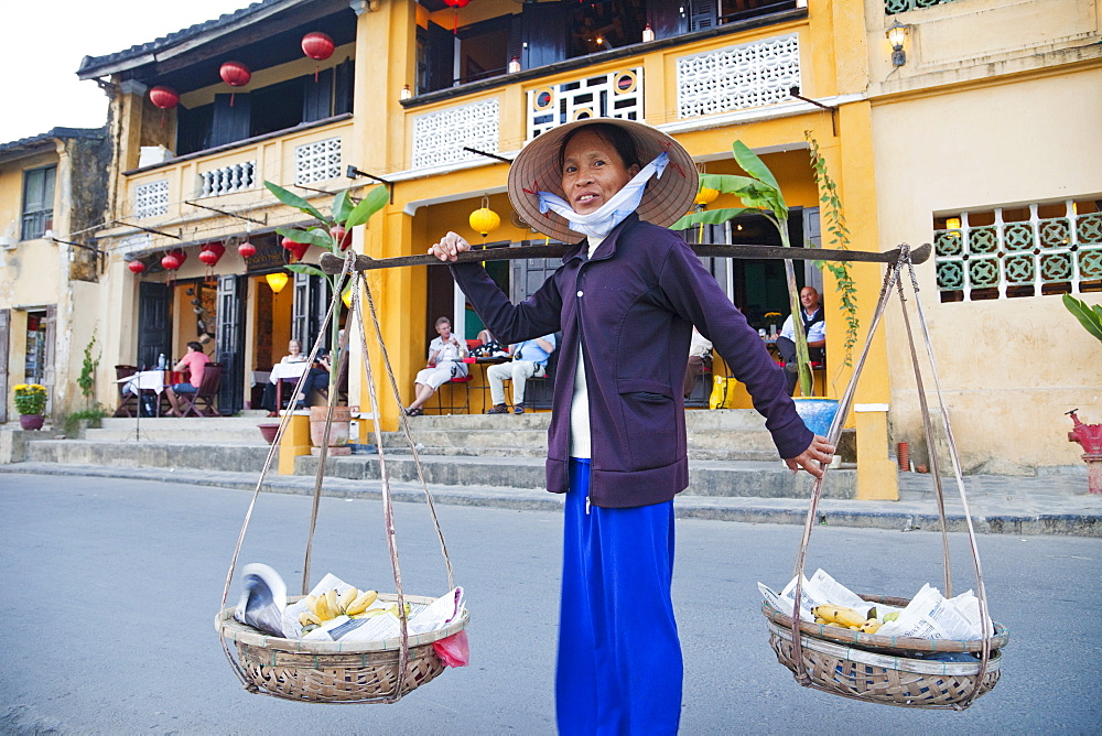 Woman wearing conical hat, Old Town, Hoi An, Vietnam, Indochina, Southeast Asia, Asia