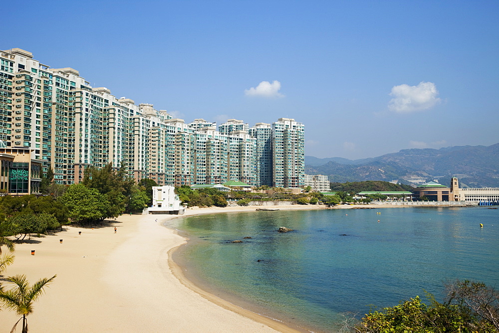 Tung Wan Beach and high rise apartments, Park Island, Hong Kong, China, Asia