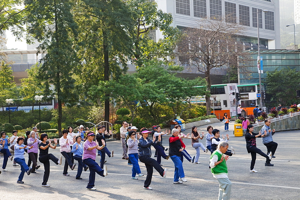 People doing Tai Chi exercise, Central, Hong Kong, China, Asia