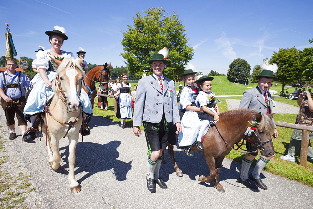 People in traditional Bavarian costume at Folklore Festival, Burghausen, Bavaria, Germany, Europe