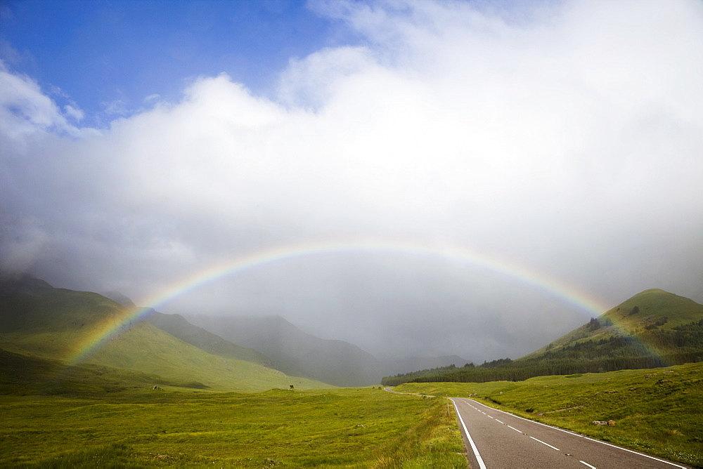 Empty road and rainbow, Highland Region, Scotland, United Kingdom, Europe