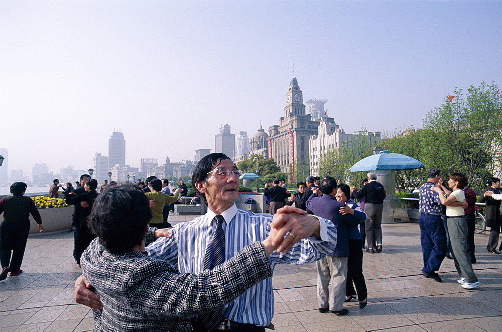 People ballroom dancing on the Bund, Shanghai, China, Asia