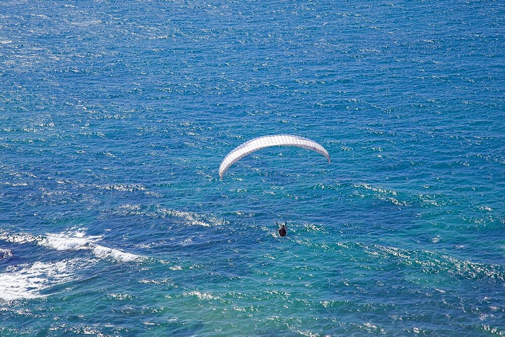 A wind glider over the coastline