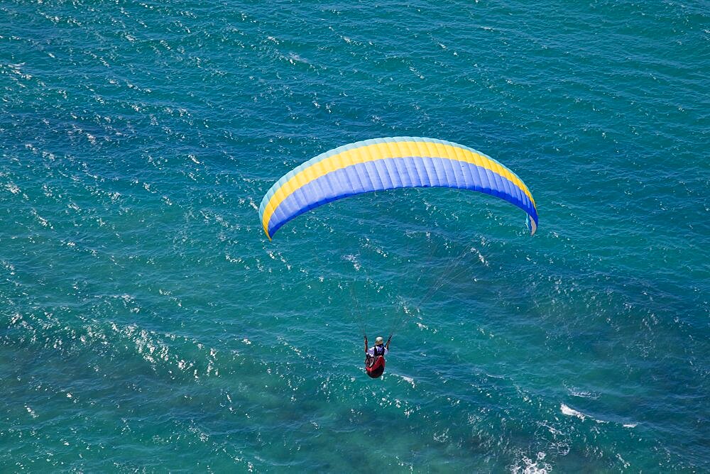 A wind glider over the coastline