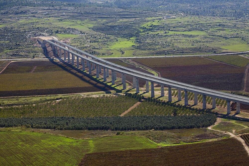 Aerial photograph of a massive Train bridge in the Plain, Israel